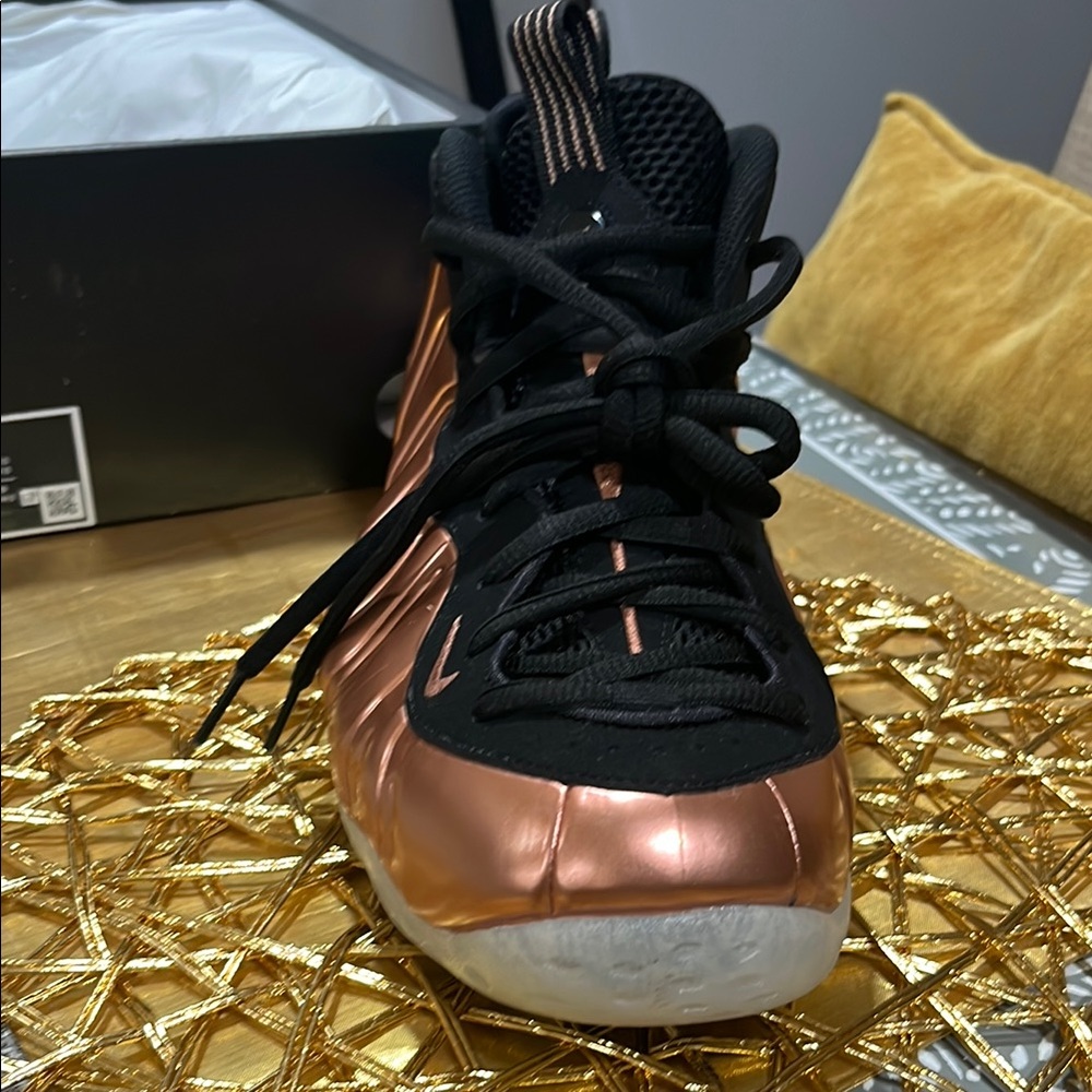 Gold and Black Athletic Shoes with Classic Design